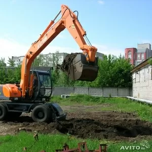 Колесный экскаватор E170W Эксмаш